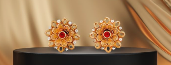 Gold floral stud earrings with a red centre